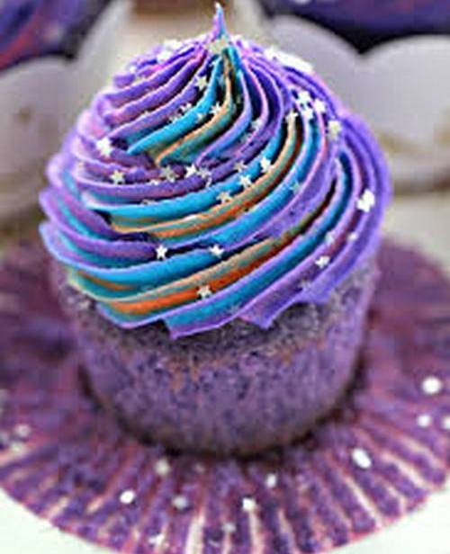 cupcake colored with berries